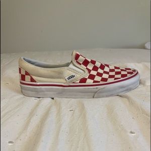 Red checkered slide-on vans